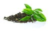 Green tea leaves on a white background